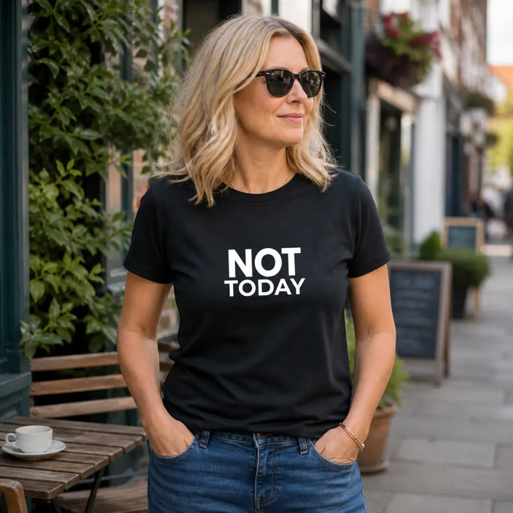 Woman over 40 wearing a Not Today slogan t-shirt on a hot tired day