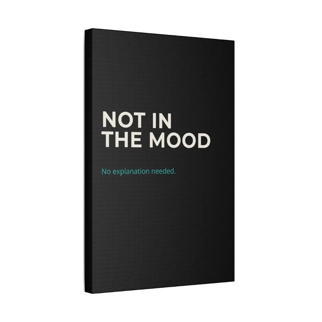 close up of black Not In The Mood satin canvas print with cream typography