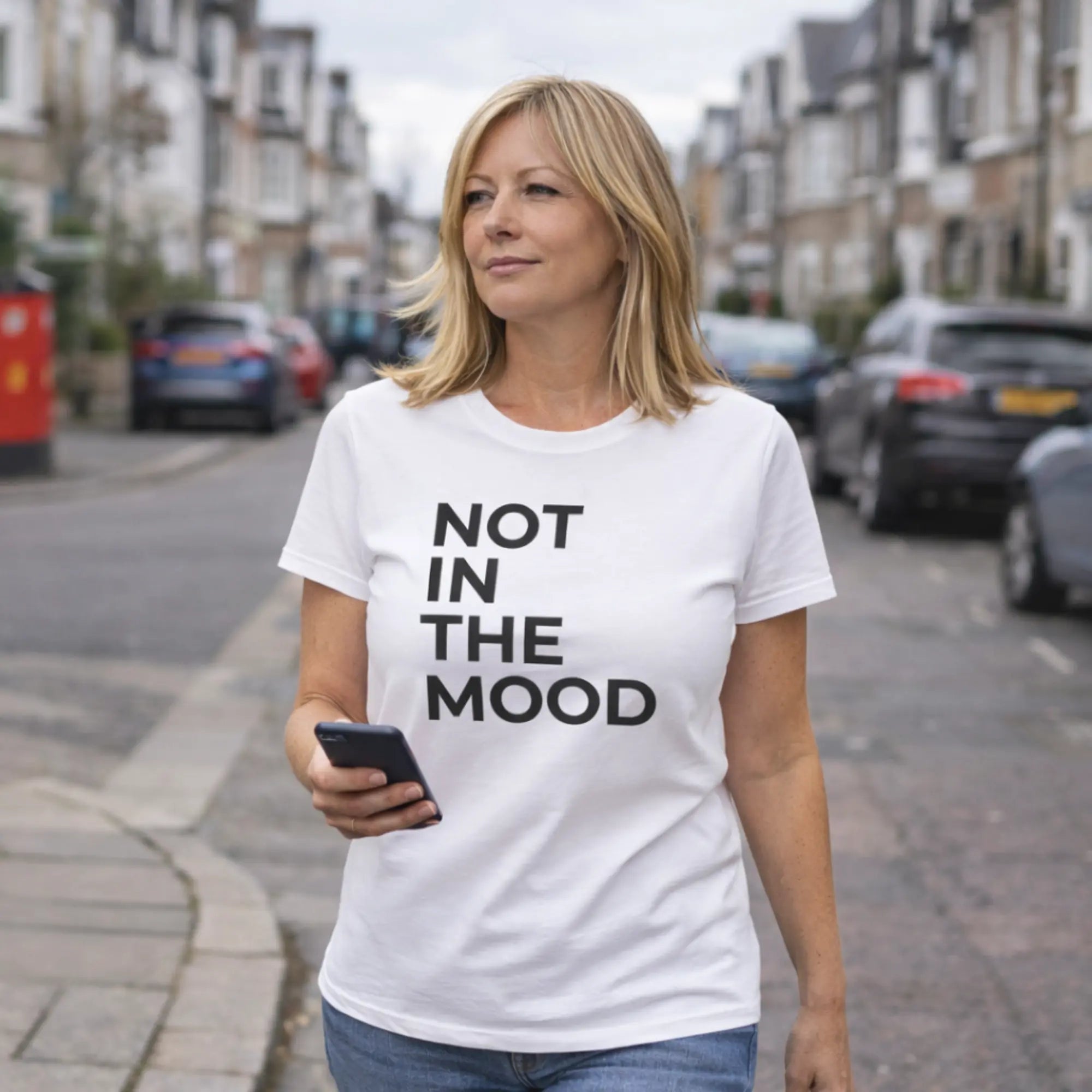 Not in the mood t shirt UK white women’s slogan tee worn on UK street