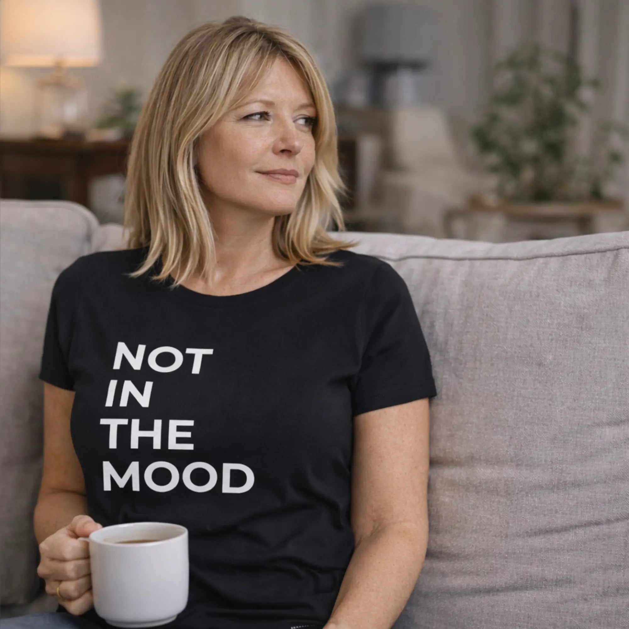 Not in the mood t shirt UK black women’s slogan tee styled at home with coffee