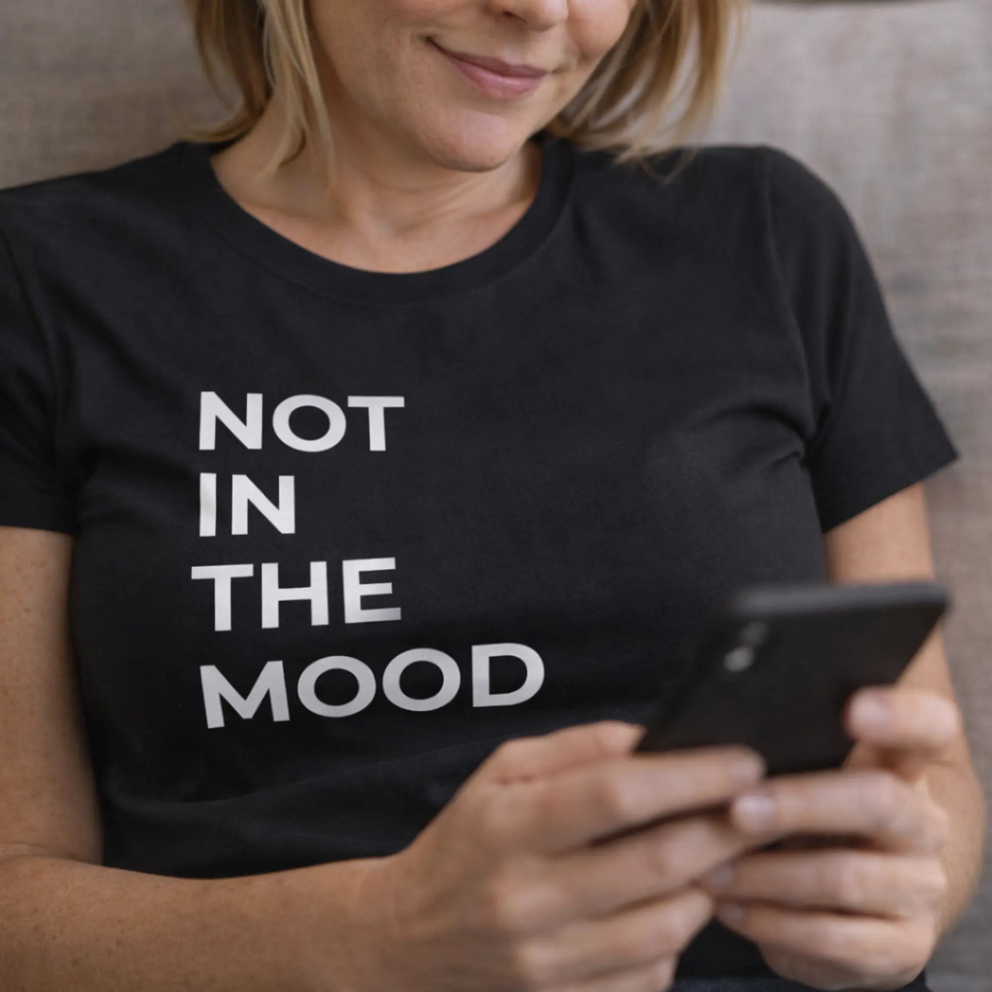 Not in the mood t shirt UK black women’s slogan tee close up of printed design